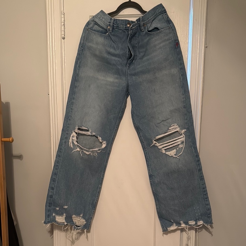 Distressed Blue Denim Jeans